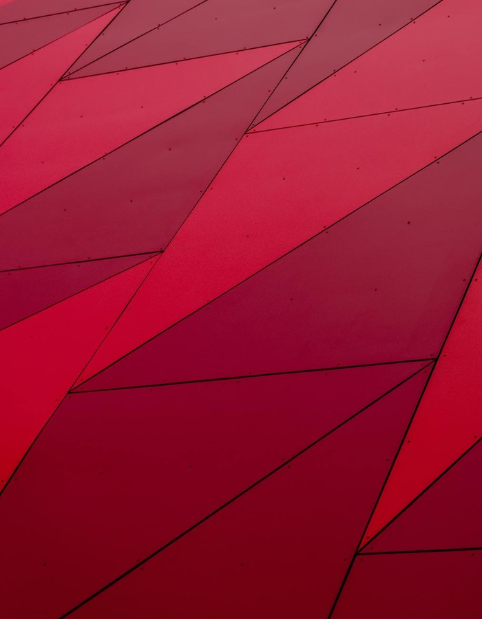 An abstract geometric pattern with red triangles, perfect for modern design needs.